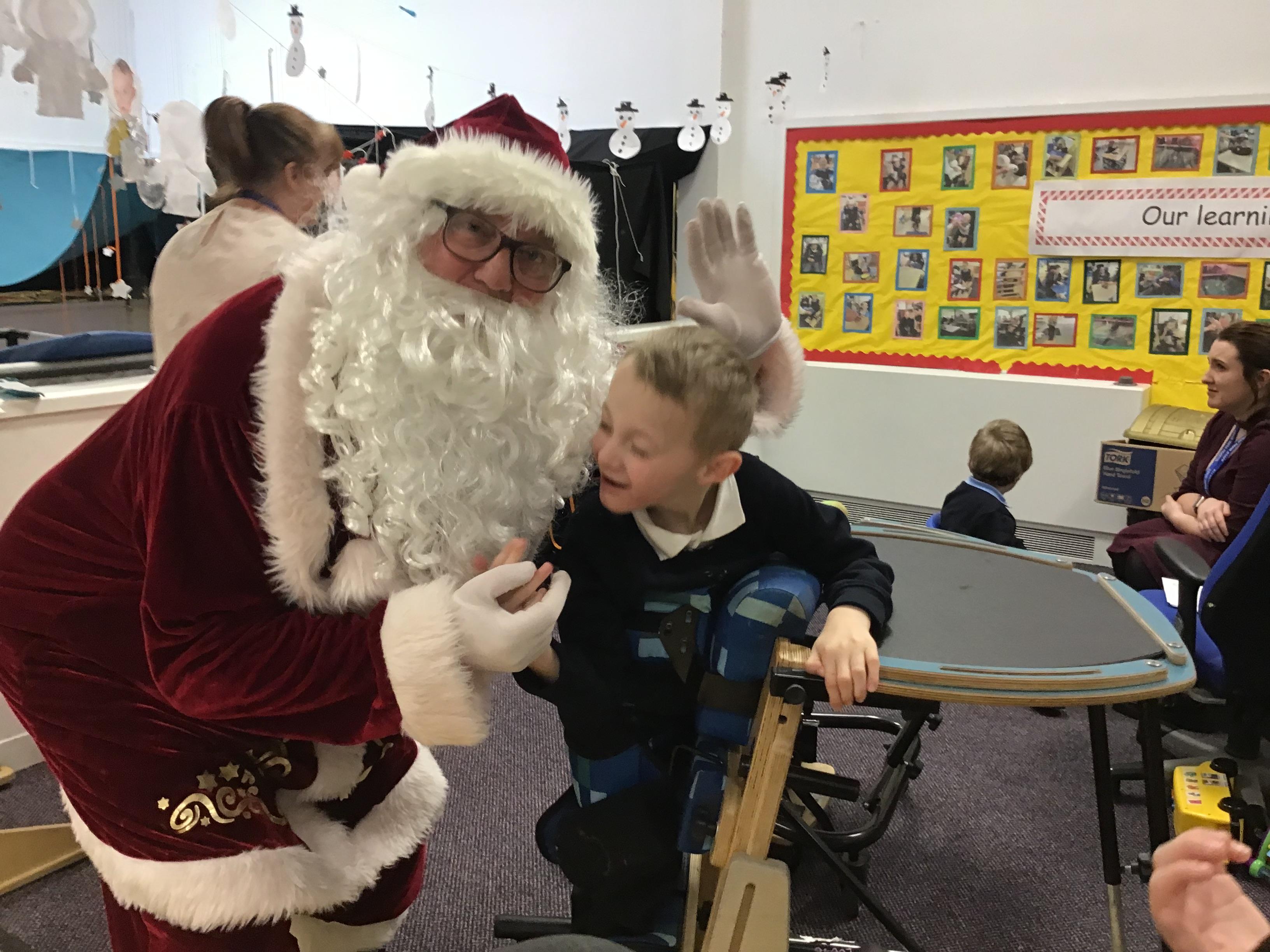 I can turn round in my standing frame to see Santa